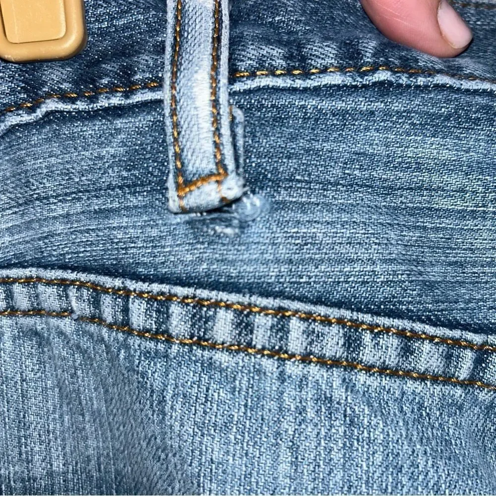 Levi’s 505 Distressed Denim Jeans